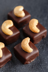 Handmade chocolate bonbons with cashew