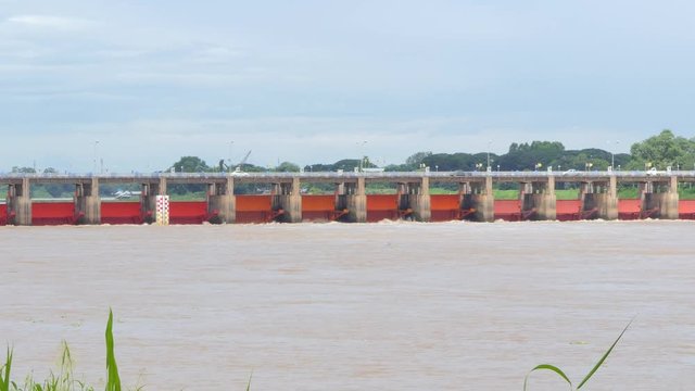 Floodgate of dam in Chao Phraya River, for agriculture and flood protection in Central Thailand. Zoom in. 
