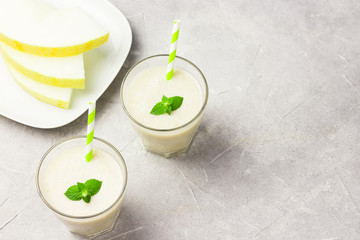 Cantaloupe melon mint smoothie. Selective focus, copy space.