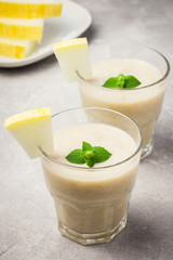 Refreshing melon mint smoothie. Selective focus, copy space.