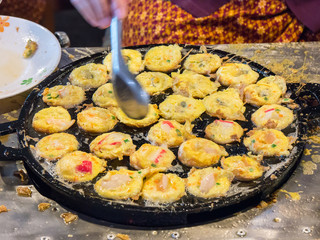 Serabi Thai gourmet seafood in a hot oven.