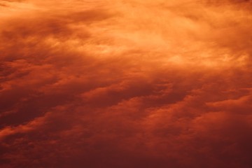 Fototapeta na wymiar red sunrise cloudscape, top view