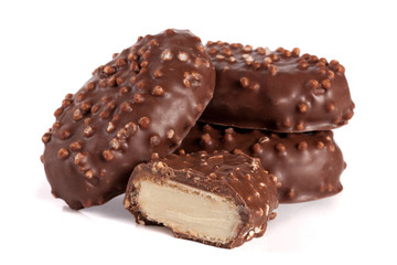 chocolate candy with white cream filling isolated on white background