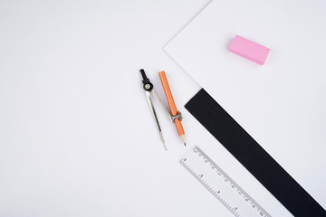 Back to School concept. Studying elements on a white background in a top view or flat lay