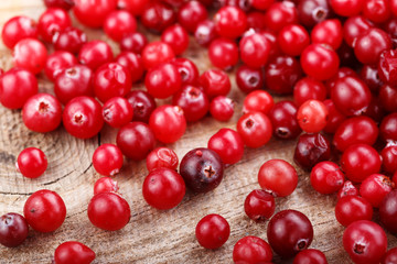Raw cranberries are scattered
