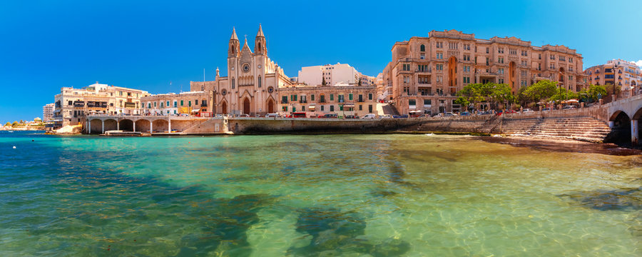 Balluta Bay and Neo-Gothic Church of Our Lady of Mount Carmel, Balluta parish church, Saint Julien, Malta