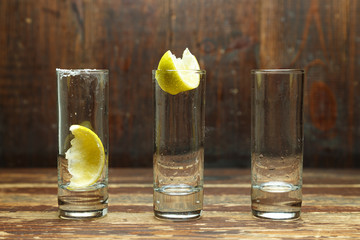 empty glasses with lemon