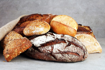 Freshly baked bread. Different kinds of bread and bread rolls on