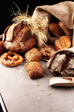 Freshly baked bread. Different kinds of bread and bread rolls on