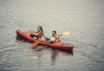 Couple travelling by kayak