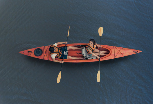 Couple travelling by kayak