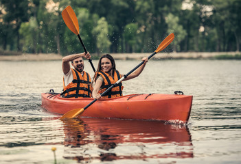 Couple travelling by kayak