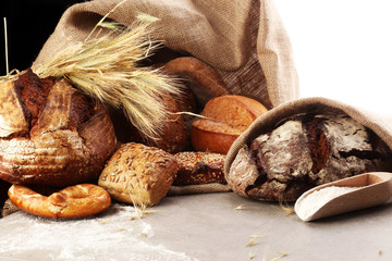 Freshly baked bread. Different kinds of bread and bread rolls on