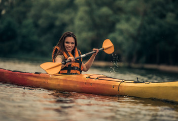 Woman and kayak