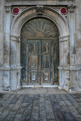 Old antique wooden door peeling paint marble vintage portal doorway