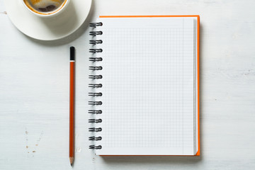 Coffee with notepad and pen