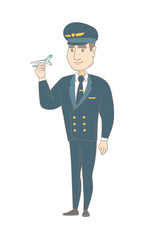 Young caucasian airplane pilot holding the model of airplane in hand. Full length of pilot in uniform with the model of airplane. Vector sketch cartoon illustration isolated on white background.