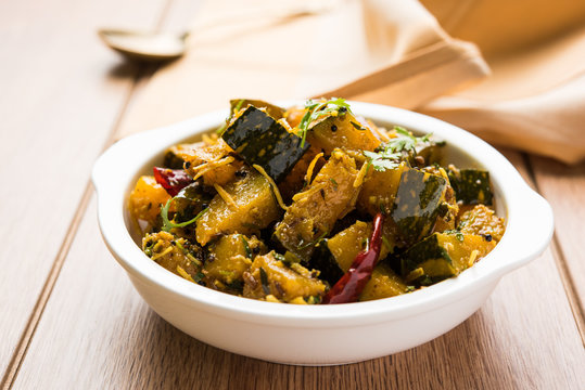 Popular indian main course vegetable Pumpkin dry curry or kaddooor kaddu ki sabzi in hindi, lal bhopla chi bhaji in marathi, selective focus
