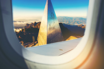 Triangle Landmark of fansipan moutain, Sapa, Vietnam as seen through window of an aircraft.