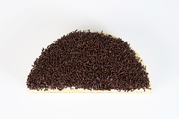 cheese cake whole topped with chocolate sprinkles rice