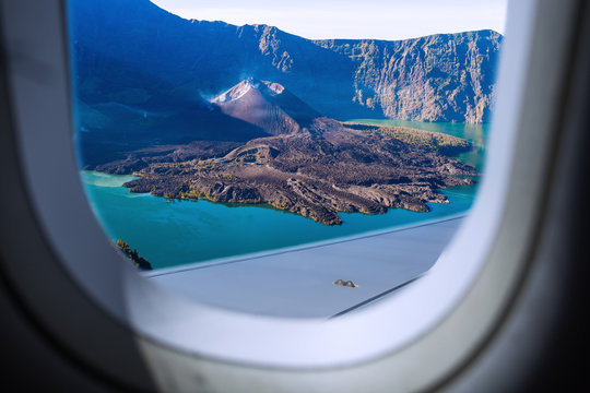 Fototapeta Mount Rinjani Volcano, Indonesia as seen through window of an aircraft.