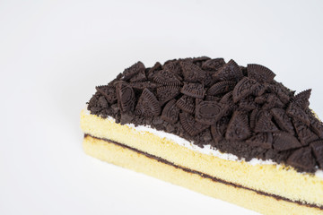 Chocolate cookies oreo cheese cake whole on white dish