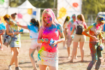 Portrait of happy girl on Holi color festival