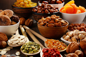 Composition with dried fruits and assorted nuts