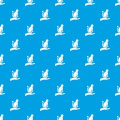 Hand holding a cat pattern seamless blue
