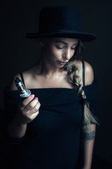 young woman smoking electronic cigarette