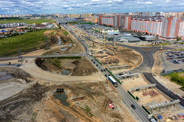 Tyumen, Russia - June 1, 2017: Construction of two-level outcome on bypass road on Fedyuninskogo...