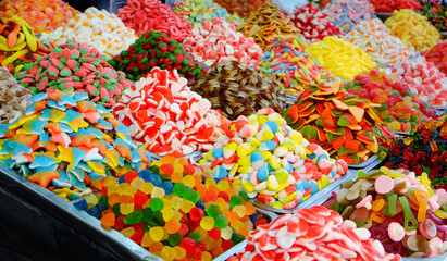 Colorful jelly candies at market, closeup