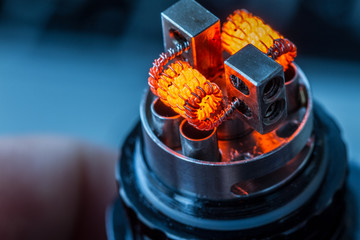 Coil on an electronic cigarette. Vape close up