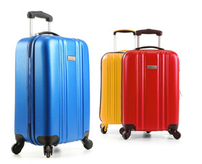 Travel suitcases isolated on white background