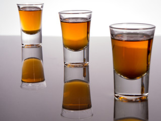 Whisky shot glass with reflections