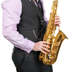 Fototapeta premium Man playing on a saxophone