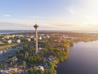 Aerial view of the Tampere city at sunset with colorful clouds