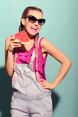 Positive energy from beautiful young woman. Summer portrait with watermelon.