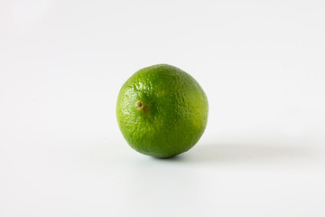 Lime isolated on white background, close up photo