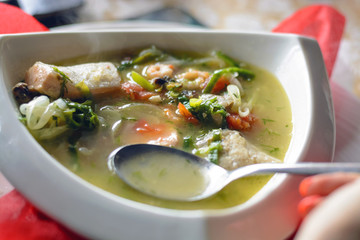 Bouillabaisse fish soup with seafood, salmon fillet, shrimp, rich taste, tasty dinner