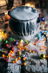 Halloween: Candy Surrounds Cauldron With Magic Potion