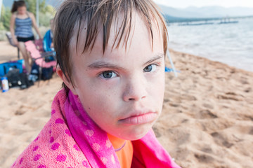 Boy With Downs Syndrome at the Beach