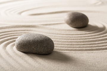 Stone on sand.