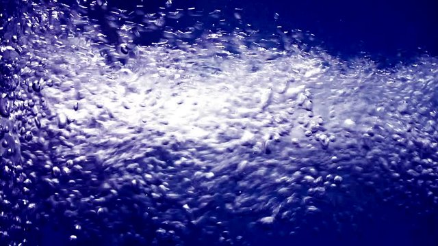 Water bubbles in slow motion, fresh bubbles splash falling down into water