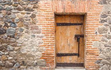 Fototapeta na wymiar wooden door in the medieval castle