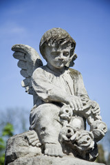 Fototapeta na wymiar Angel as a symbol of faith, kindness and love. Ancient statue.