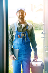 Portrait of handsome worker, service man, plumber or electric - 167847014