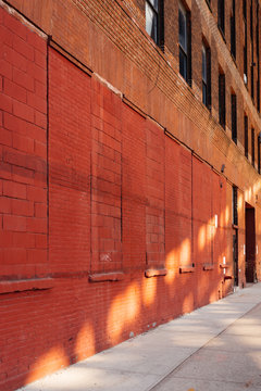 Sunlight on a brick wall buidiling