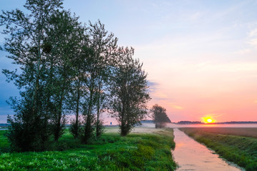 Landscape with the image of summer dawn
