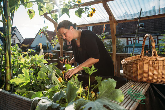 People: Gardener in her urban garden